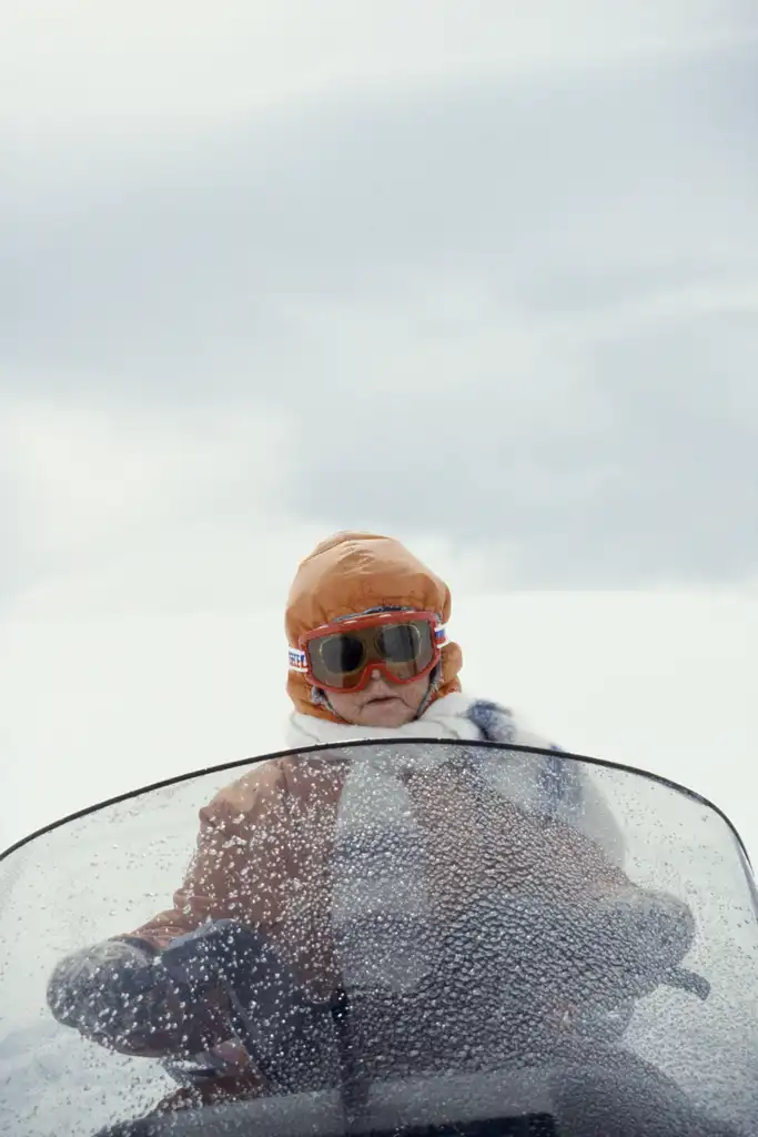 A woman on a snowmobile